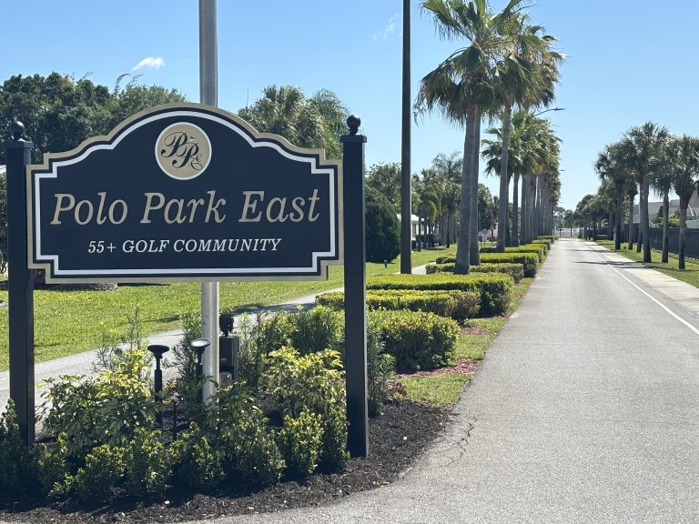 Sign on golf course cart path